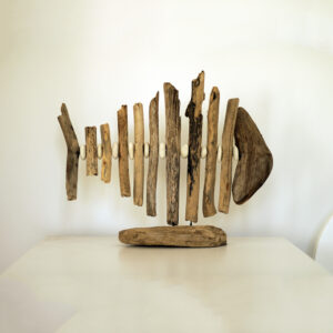 Wooden fish & pebbles